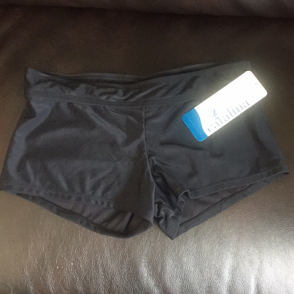 NWT. Black swim shorts.